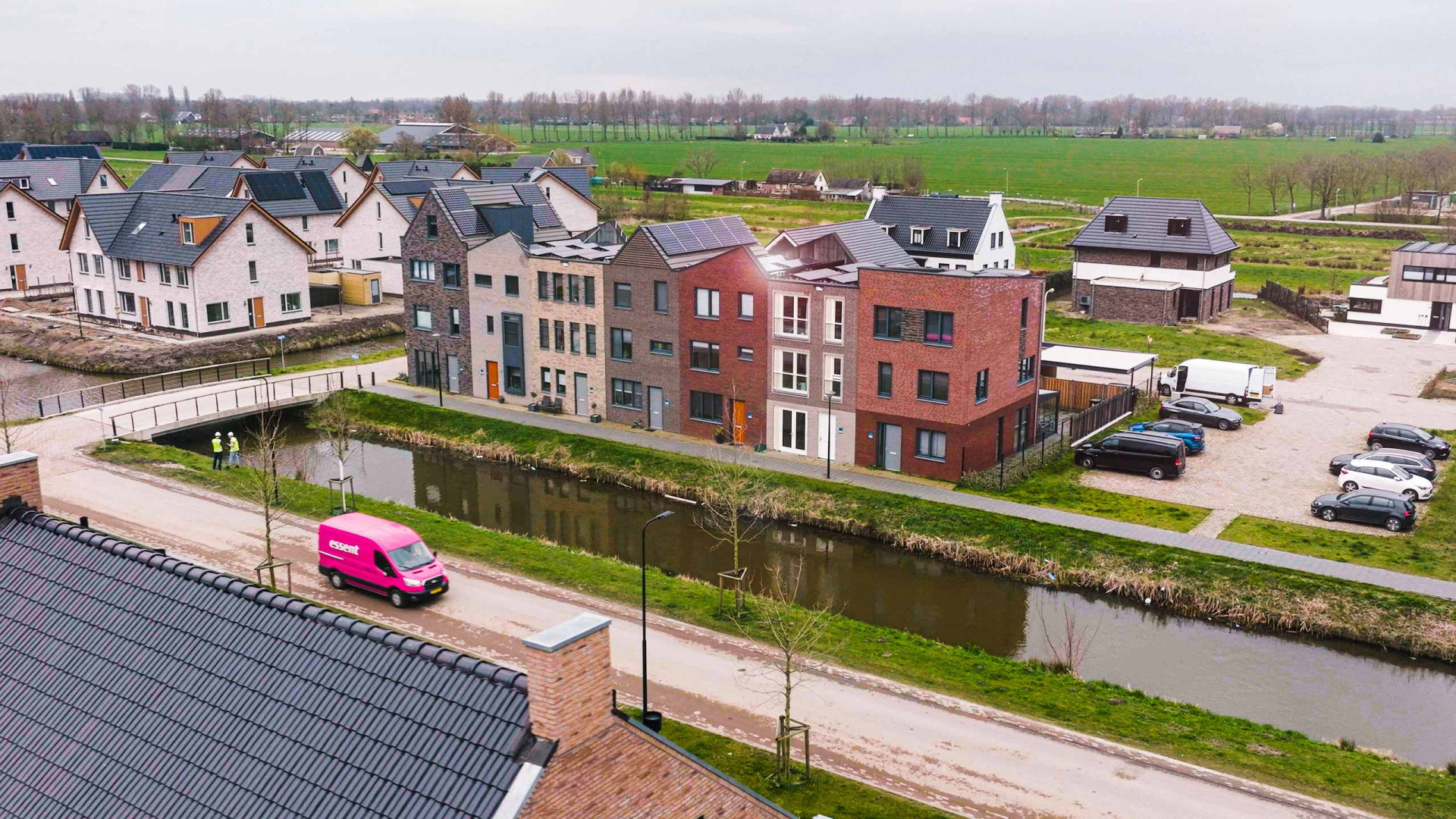 Aerial view of a Dutch neighbourhood with an Essent service van